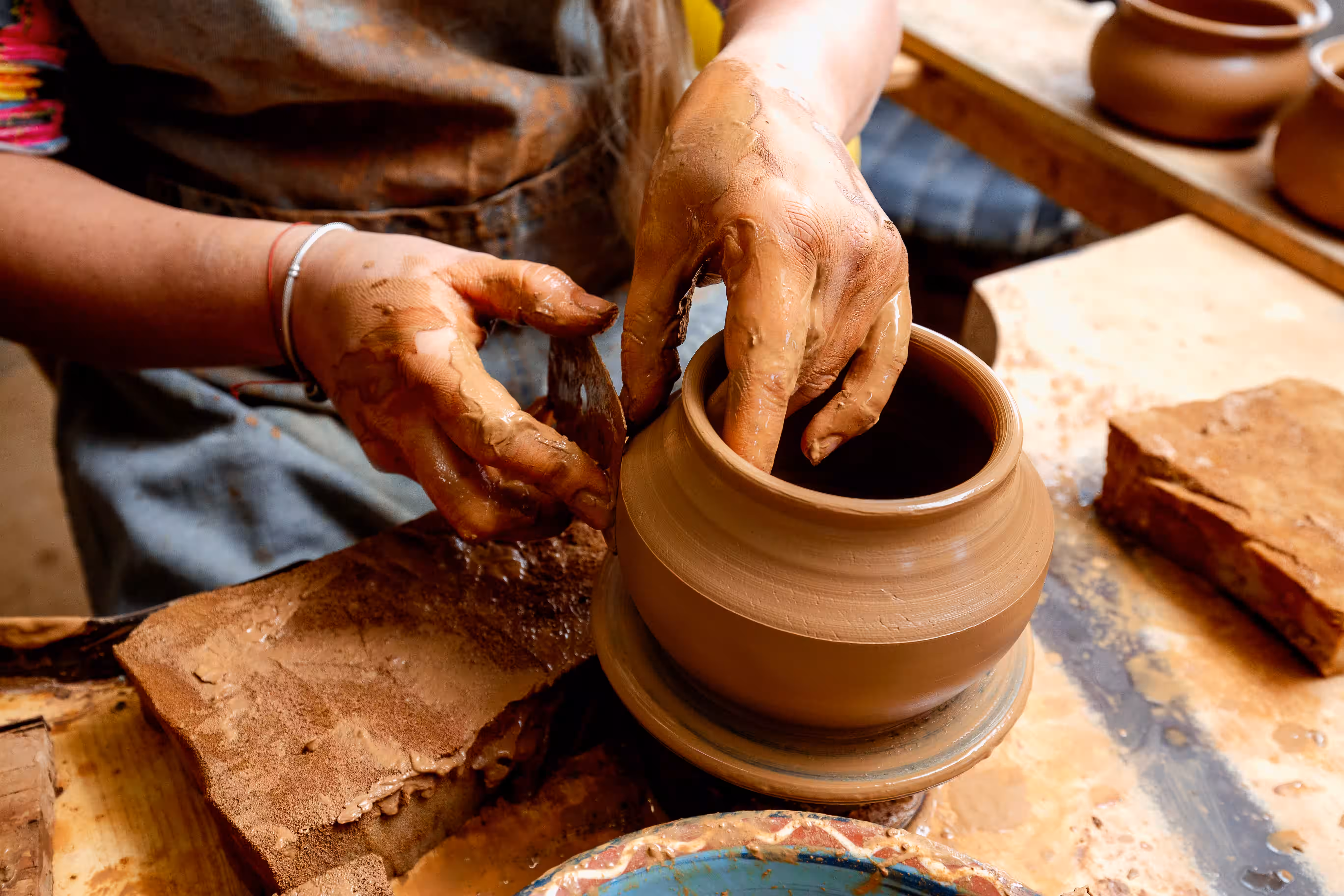 Shaping on Potter's Wheel